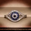 New Punk Female Blue Crystal Stone Ring Charm Zircon Silver Color Nedder Wedding Jewelry for Women Evil Evil Eyval Hollow Lisagement L230704