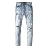 Dżinsy designerskie dżinsy dla spodni Man biały czarny rockowy odrodzenie motocyklowe spodnie spodni złamana dziura haft haft hip hop dżins Pantalones VQSW