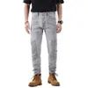 Jeans da uomo Uomo Biker in denim elasticizzato grigio per moto Streetwear Pantaloni affusolati slim Pantaloni patchwork plissettati