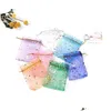 حقائب المجوهرات أكياس أكياس JolemryPouches عرض المجوهرات 100pcsmoon Star Organza صغير عيد الميلاد Dstring حقيبة سحر التغليف dhaar