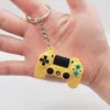 Nyckelkedja män kvinnor tecknad gamepad modell keyring pvc flexibelt lim material mode blandad färg bilväska nyckelchain charm hängande spänne smycken tillbehör