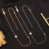 Commercio all'ingrosso Designer 18K Placcatura in oro Collane con ciondolo Famoso marchio Lettera Acciaio inossidabile Collana di cristallo Amanti Accessori per gioielli per feste