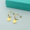 Stainless steel new T-letter C-shaped hanging peach heart single diamond earrings simple and versatile love with diamond earrings