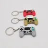 Nyckelkedja män kvinnor tecknad gamepad modell keyring pvc flexibelt lim material mode blandad färg bilväska nyckelchain charm hängande spänne smycken tillbehör