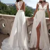 Sukienki swobodne biała koronkowa sukienka Summer Sexy Deep V-deckless Backless High Slit Sturns Długie druhna szlafroki