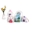 حقائب المجوهرات أكياس أكياس JolemryPouches عرض المجوهرات 100pcsmoon Star Organza صغير عيد الميلاد Dstring حقيبة سحر التغليف dhaar