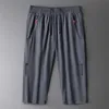 Pantaloni casual ad asciugatura rapida per uomo Pantaloncini leggeri elastici in seta di ghiaccio estiva Aria condizionata Sport Allentati Menlqeq