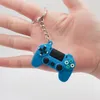 Nyckelkedja män kvinnor tecknad gamepad modell keyring pvc flexibelt lim material mode blandad färg bilväska nyckelchain charm hängande spänne smycken tillbehör