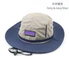 Factory spot wholesale new quick-drying drawstring fisherman hat thin pot hat female men's outdoor waterproof fishing in summer.