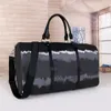 Дизайнерская дорожная сумка из искусственной кожи Дорожные сумки выходного дня Мужчины Женщины Чемоданы креативные черные сумки с вышивкой цветов 45 см Большая вместительная сумка для багажа