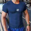 T-shirt da uomo 2023 Nuovi uomini che corrono T-shirt attillata Compressione Quick Dry T Shirt Uomo Palestra Fitness Bodybuilding Jogging Tees Top uomo Abbigliamento L230713