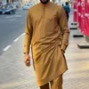 تُحدد المسارات للرجال Kaftan 2PCS ملابس رجالية قميص طويل الأكمام قمم بنطلون أفريقي داشكي الإثني على النمط العرقي للرجال أزياء ملابس الأزياء 230713