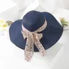 Garabalización de sombreros de ala ancha con gran sombrero de paja de dama sale de verano BLOQUE BLOQUEA BEACH