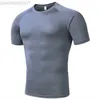 T-shirt da uomo 2023 NUOVA estate di alta qualità T-shirt ad asciugatura rapida da uomo che corre camicia a maniche corte skinny da uomo palestra fitness bodybuilding t-shirt sportiva L230713