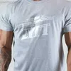 T-shirt da uomo T-shirt da palestra da corsa T-shirt da uomo in cotone Fitness T-shirt a maniche corte allentata T-shirt sportiva da bodybuilding Abbigliamento moda estiva L230713