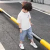 Set di abbigliamento Tuta estiva per ragazzi 2023 Bambini Streetwear T-shirt a maniche corte per ragazzo Pantaloncini Set sportivo in due pezzi Completi larghi per bambini 230714