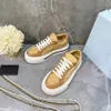 Designers de luxo feminino Sapatos casuais de alta e baixa gangue Tênis de corrida Macro Re-Nylon Couro escovado Tênis sola de borracha Tênis de moda de luxo atacado quente