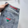 Calças jeans masculinas de luxo novas de primeira linha com estampa de lavagem esguias finas e casuais