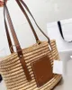 Borse da spiaggia alla moda firmate di lusso da donna essenziali per le vacanze al mare borsa a tracolla personalità in paglia borsa tessuta da donna di alta qualità