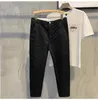 Pantalons pour hommes printemps été décontracté hommes Slim travail bouton doux formel pantalon mâle corée couleur unie marque vêtements grande taille L80