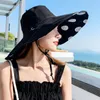 Chapeaux à large bord printemps été femme grand chapeau de seau de voyage en plein air mode pliable Dot chapeau de soleil défendre les casquettes de plage ultraviolettes