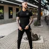 T-shirt da uomo new Maglietta da palestra Uomo Fitness Sport Cotone Uomo Bodybuilding Allenamento Maglietta skinny Estate Casual Top Abbigliamento Uomo T-shirt L230715