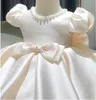 Robes de fille bébé filles robe perles arc né robe de baptême pour bébé 1ère année robes de fête d'anniversaire manches bouffantes vêtements pour tout-petits 230714