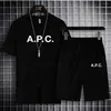 Fatos de treino masculinos APC Summer Selling Poliéster Conjunto de manga curta Shorts de cor sólida Estampado Roupa casual Jogging