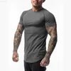 T-shirt da uomo 2021 Gym Sport Running T-shirt da uomo Fitness Slim Alta elasticità Traspirante Quick Dry Bodybuilding Tight Mens Tshirt Uomo Tee Tops L230715