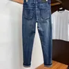 Herrenjeans Designer-Modejeans Fold Line Patch Wash bedruckte Motorradelemente Elastisch lässig mit nostalgischen Farben DDBT