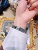 Luxuriöse Damenuhr mit Quarzwerk, 904-Edelstahl-Uhrenkette, Zifferblattdurchmesser 26 mm
