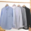 Camisas casuales para hombres Camisa de primavera Camisa japonesa Oxford Spinning Cotton Top Color sólido Empalme Cuello cuadrado suelto Mangas largas