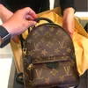 Hochwertige Dame Luxurys Umhängetasche Designer Frau Mini Reiserucksack Mädchen Schule Umhängetaschen Designer Frauen Geldbörse Einkaufstasche Brieftasche Männer Braune Blumenhandtaschen