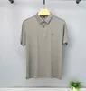 Herrpolos high end varumärke is silke fast färg kort hylsa utsökt tryckt polo skjorta fashionabla lapel cool andas t-shirt