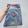 Calças jeans masculinas de luxo novas de primeira linha com estampa de lavagem esguias finas e casuais