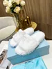 Sandales de créateurs de luxe célèbres femmes hommes curseurs à fond épais appartements tongs plate-forme perforée imprimé animal diapositive en caoutchouc 0709