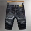 Erkek kot yaz moda tasarımcısı erkekler retro siyah mavi elastik nakış kısa yırtık yamalı vintage denim şort hombre