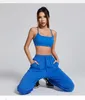 Aktiva uppsättningar Shinbene 2 -bitar Kvinnor Backless BH och joggar Träningskläder Set Yoga Gym Lounge Pants