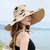 Chapeaux à large bord printemps été femme grand chapeau de seau de voyage en plein air mode pliable Dot chapeau de soleil défendre les casquettes de plage ultraviolettes