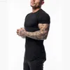 T-shirt da uomo 2021 Gym Sport Running T-shirt da uomo Fitness Slim Alta elasticità Traspirante Quick Dry Bodybuilding Tight Mens Tshirt Uomo Tee Tops L230715