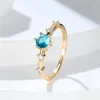 Anneaux de mariage luxe femme charme eau bleu Zircon anneau couleur or jaune pour les femmes ronde cristal pierre fiançailles bijoux