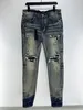 Mäns jeansdesigner Smens Jean Hombre byxor män broderiPatchwork rippade för trendmärke Motorcykelbyxa Minny Hip Hop Street Cowboy Pants