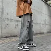 Jeans da uomo Pantaloni strappati hip-hop Moda uomo Pantaloni larghi casual Streetwear di alta qualità Denim a gamba larga C176