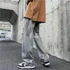 Jeans da uomo Pantaloni strappati hip-hop Moda uomo Pantaloni larghi casual Streetwear di alta qualità Denim a gamba larga C176