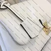 Woman Madeleine BB Lock type handbag Embossed Leather designers messenger bag Adjustable strap Commuting Bag M45977