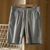 Männer Shorts Sommer Waffel Einfache Atmungsaktive Casual Pendler Elastische Taille Strand Tasche Harajuku Gerade Kleidung