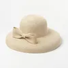 Cappelli a tesa larga Vintage Dome Dropped Eaves Bowknot Paper Straw Top Hat Protezione solare Stage Show Forma concava