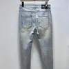 Jeans para hombres Diseñador Diseñador Jeans clásicos para hombres Europa hace que la gente crea Estrella Bordado Costura Rip Trend Marca Pantalones de motocicleta Hombres Thin NSVR