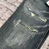 Jeans da uomo viola tendenza pantaloni firmati di marca strappati dritti regolari larghi lavati vecchio buco lungo stack Rvmn ZM10