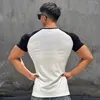 T-shirts pour hommes sports d'été façonnage coupe ajustée tendance col rond manches courtes course à pied loisirs de plein air élastique séchage rapide T-shirt